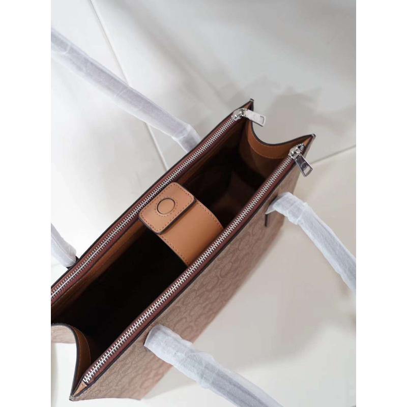 Túi công sở Coach NiNa Carryall Tote đơn giản sang trọng