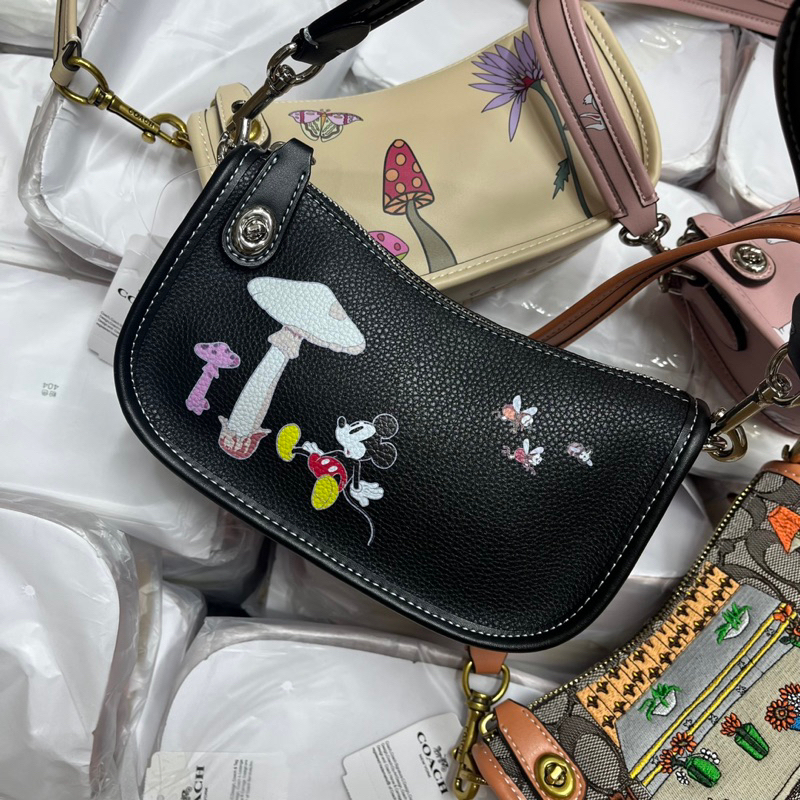 Túi coach swing kẹp nách cho nữ