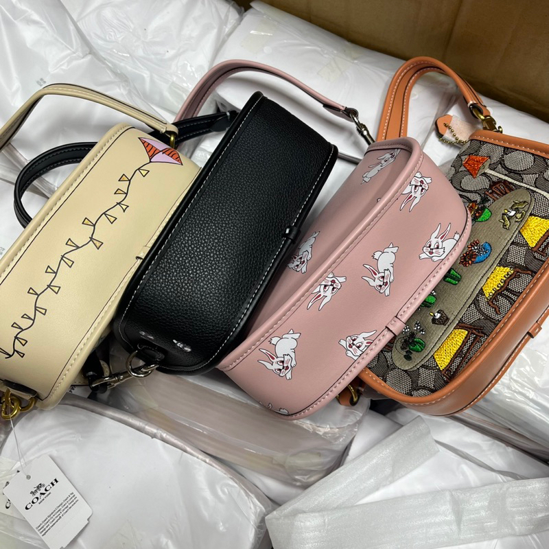 Túi coach swing kẹp nách cho nữ