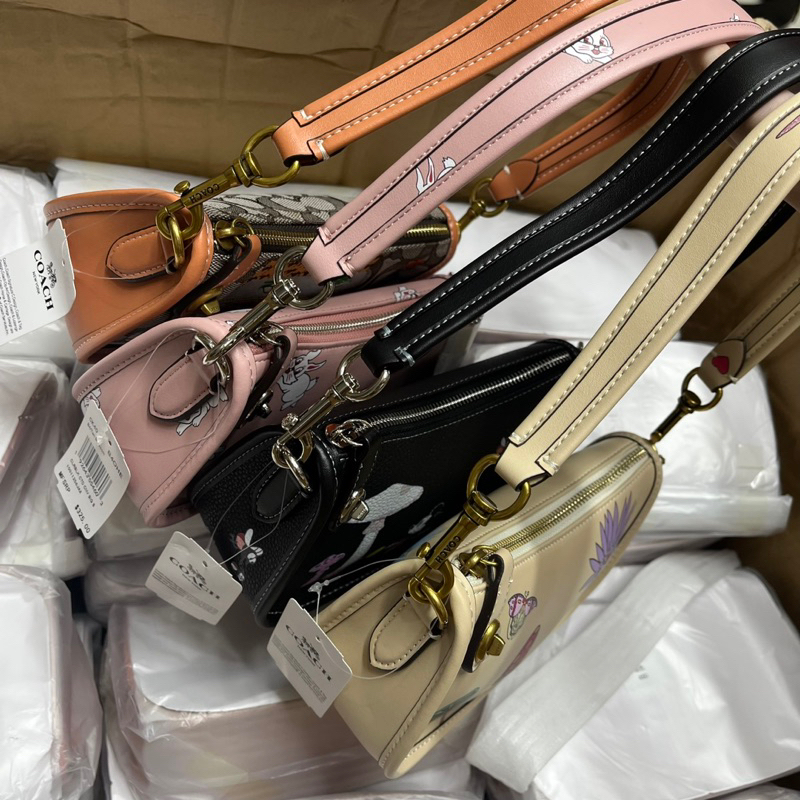 Túi coach swing kẹp nách cho nữ