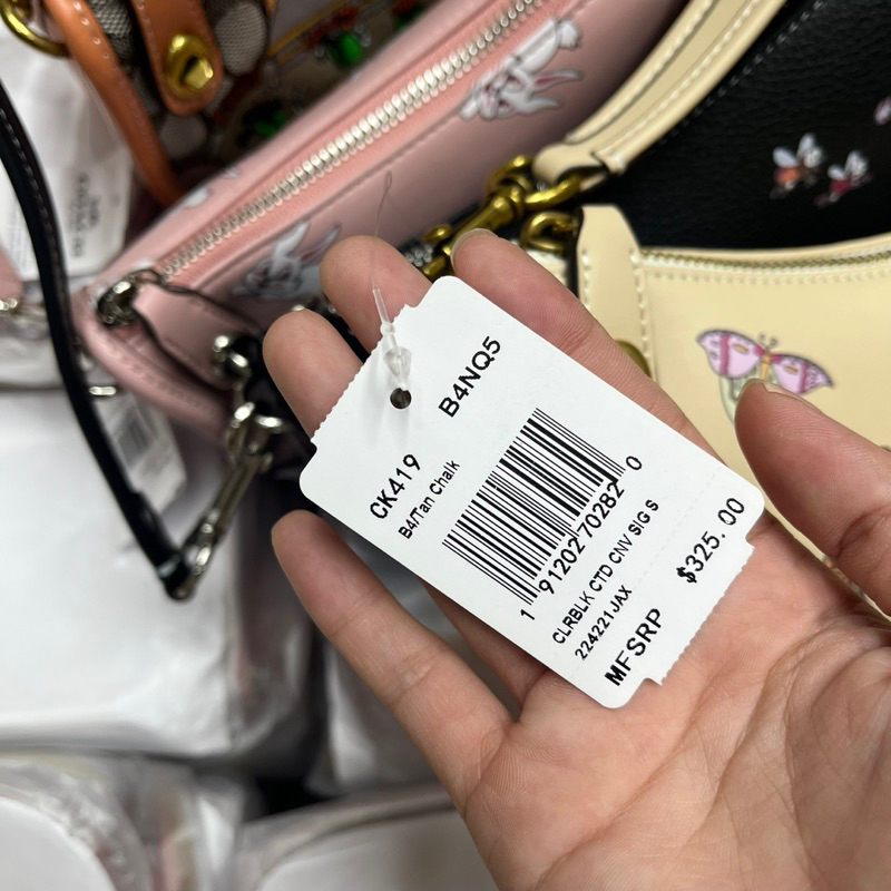 Túi coach swing kẹp nách cho nữ