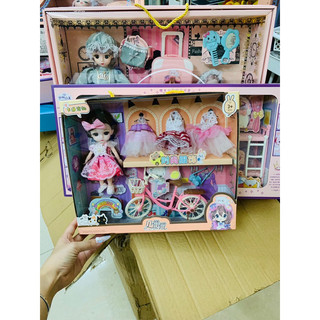 Búp bê đạp xe