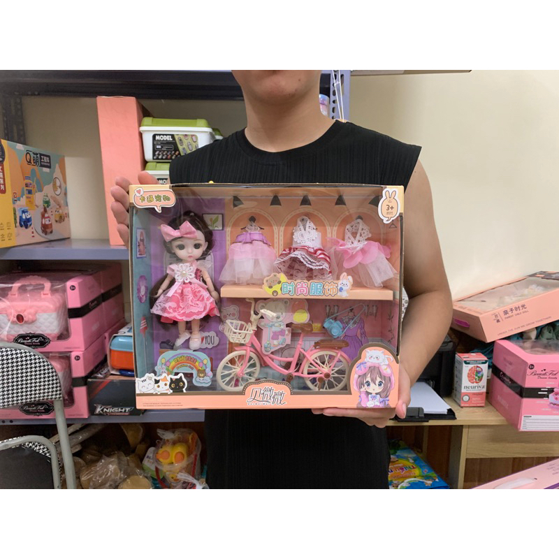 Búp bê đạp xe