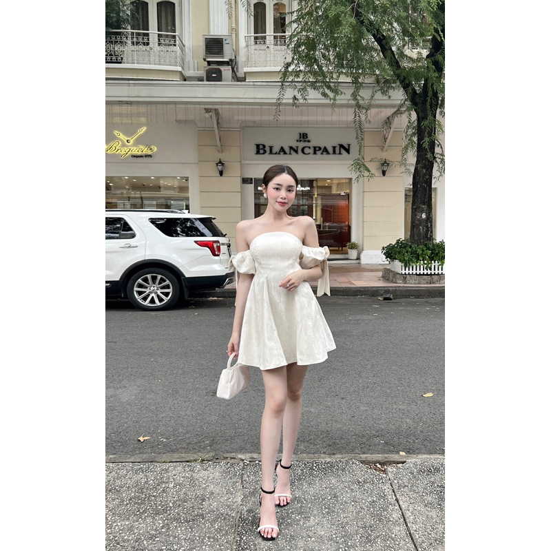 Đầm trễ vai nơ tafta BYBYPIL vân gỗ cao cấp Jasmine