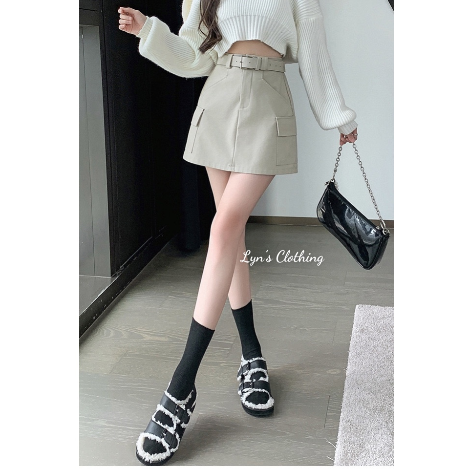 Chân váy chữ A chất da lì kèm đai phong cách Hàn Quốc