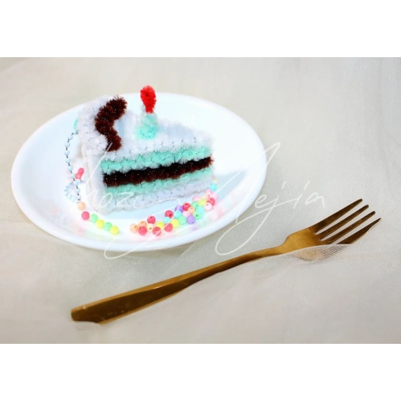 Móc khóa bánh kem kẽm nhung