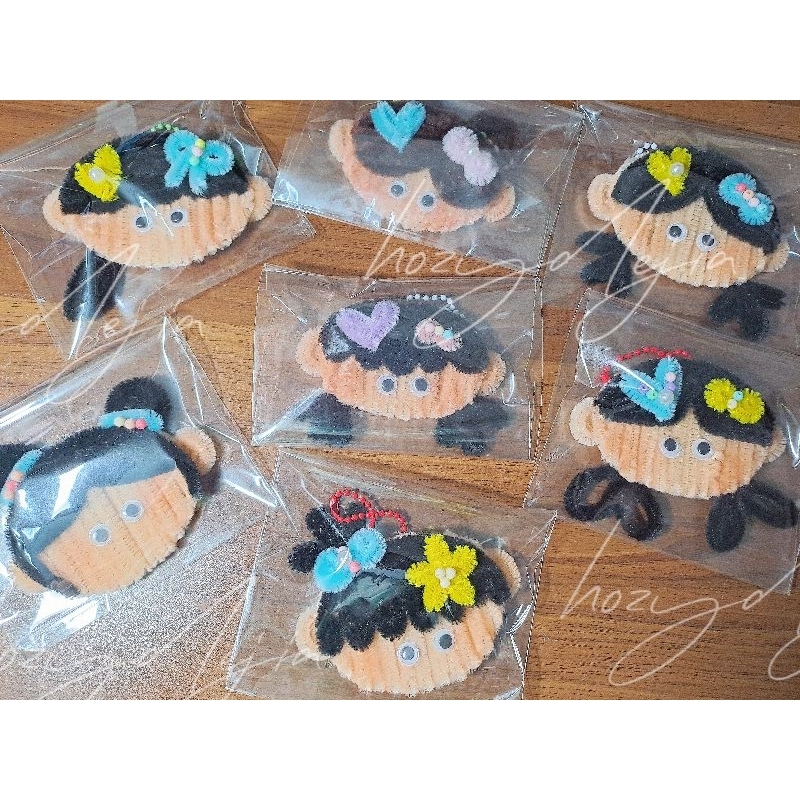 Móc khóa em bé kẽm nhung