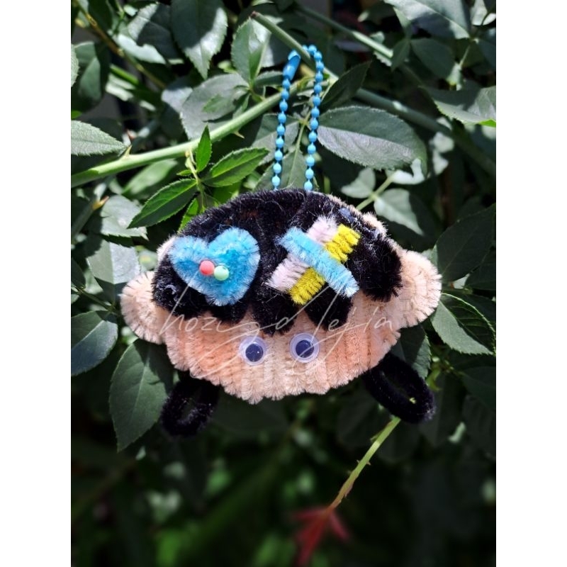 Móc khóa em bé kẽm nhung