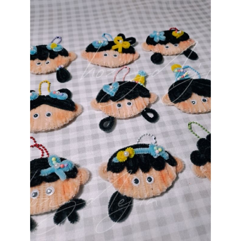 Móc khóa em bé kẽm nhung