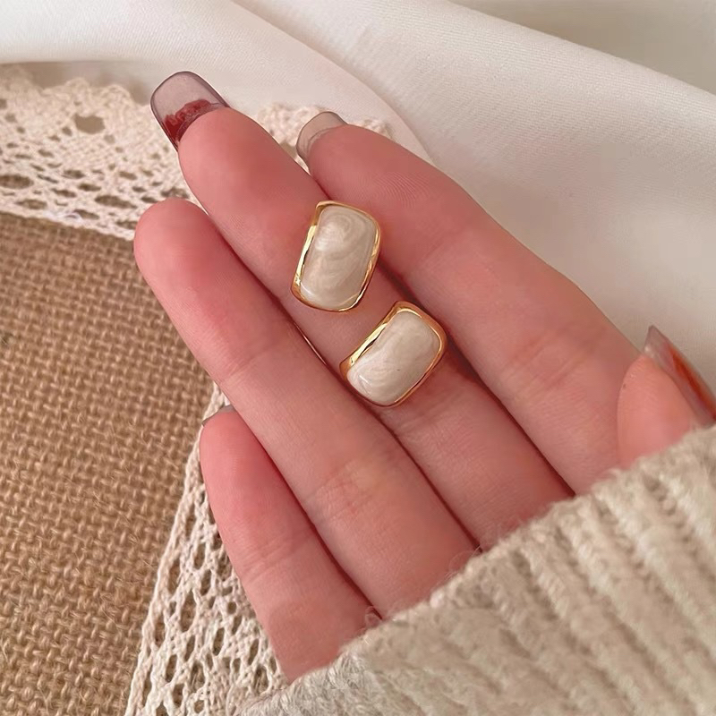 Hoa tai ánh nhũ - Khuyên tai đơn giản - khanturban.vn