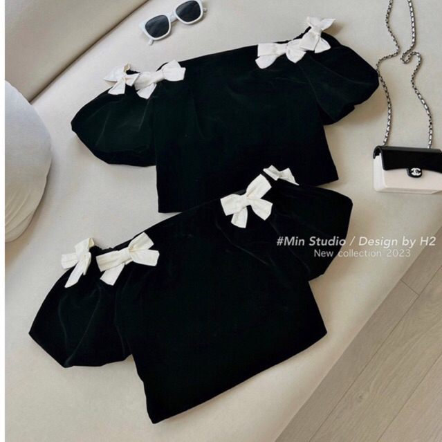 JENNYCLOSET | Áo nhung trễ vai crotop tay bồng đính nơ sang chảnh , Áo hở vai nhung cao cấp đính nơ tiểu thư