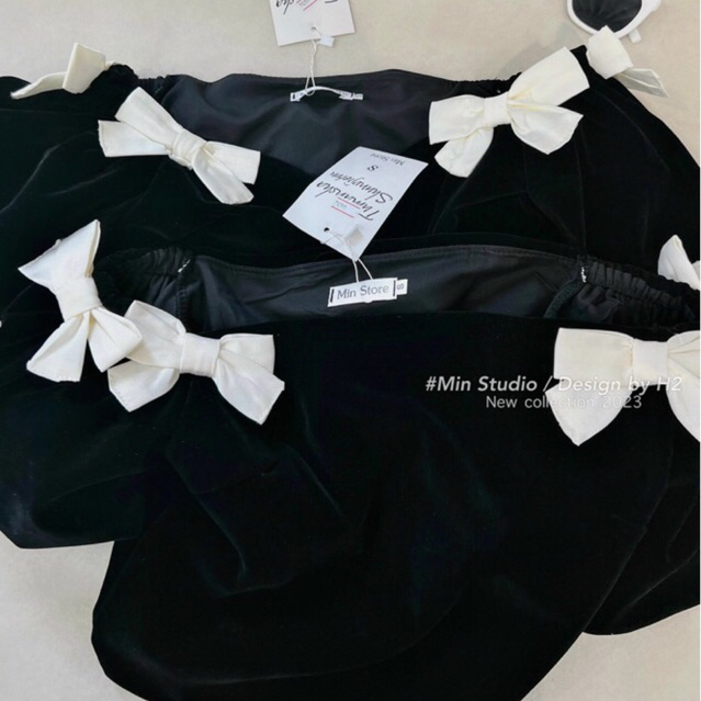 JENNYCLOSET | Áo nhung trễ vai crotop tay bồng đính nơ sang chảnh , Áo hở vai nhung cao cấp đính nơ tiểu thư