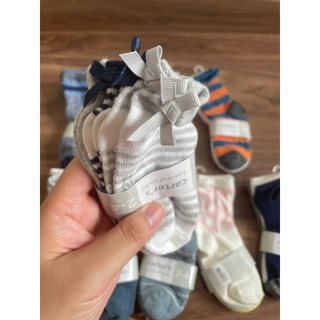 Tất carters xuất dư cho bé