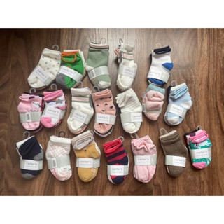 Tất carters xuất dư cho bé