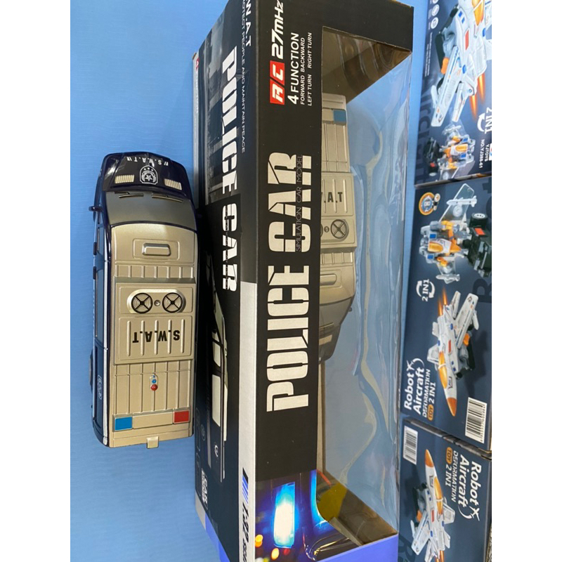 Xe  đồ chơi xe cảnh sát điều khiển QH203 có đèn pha chiếu sáng