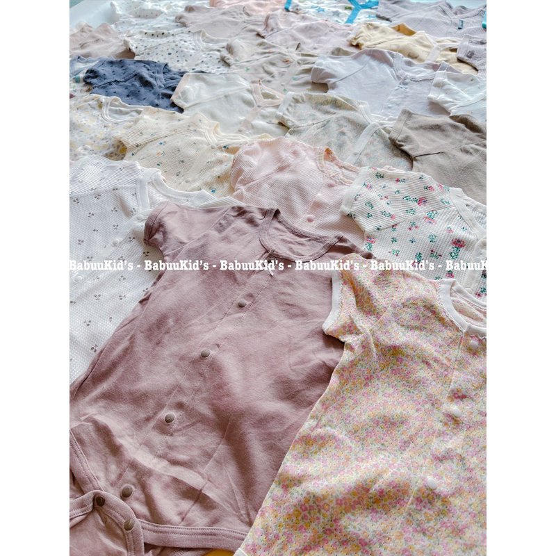 Bộ đồ liền thân cotton tay ngắn cài cúc trước Body chip Bodysuit cộc tay cho bé trai và gái hoạ tiết