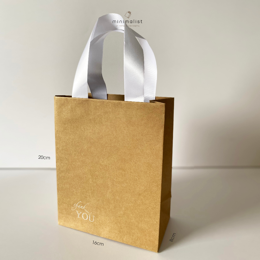 - Túi giấy kraft đựng quà, nước hoa, mỹ phẩm, quà tặng - Size vừa - Quai ruy băng dán cao cấp