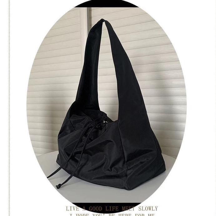 Túi đeo chéo bao tử dây rút vải dù chống thấm nước Sereinclothing.st2w dành cho nữ