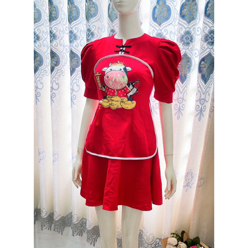 Set áo cổ tàu tay bồng đính kim sa hình bò sữa và chân váy