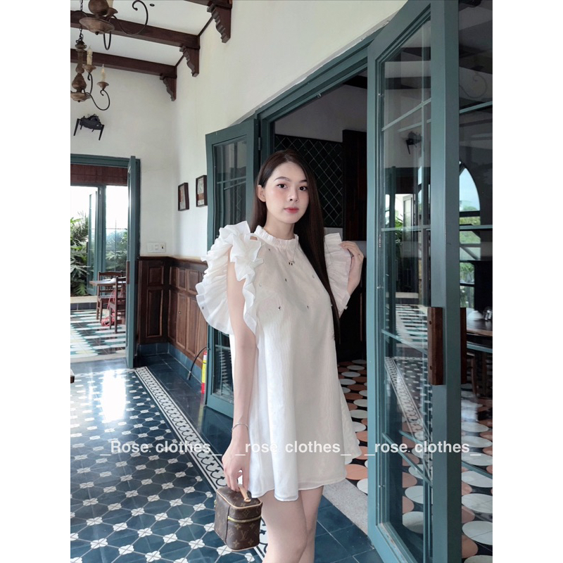 Lyra Dress váy thiết kế dáng suông phối tay áo cánh tiên màu trắng nhẹ nhàng phong cách sang hợp dự tiệc. Ảnh thật