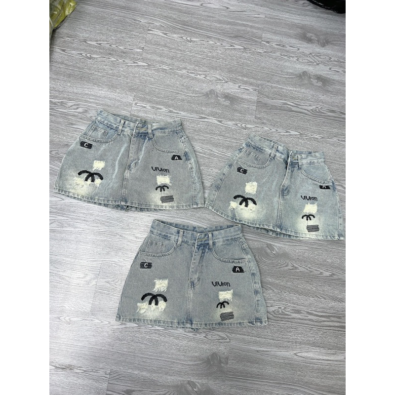 Chân váy jean  chữ X thêu
