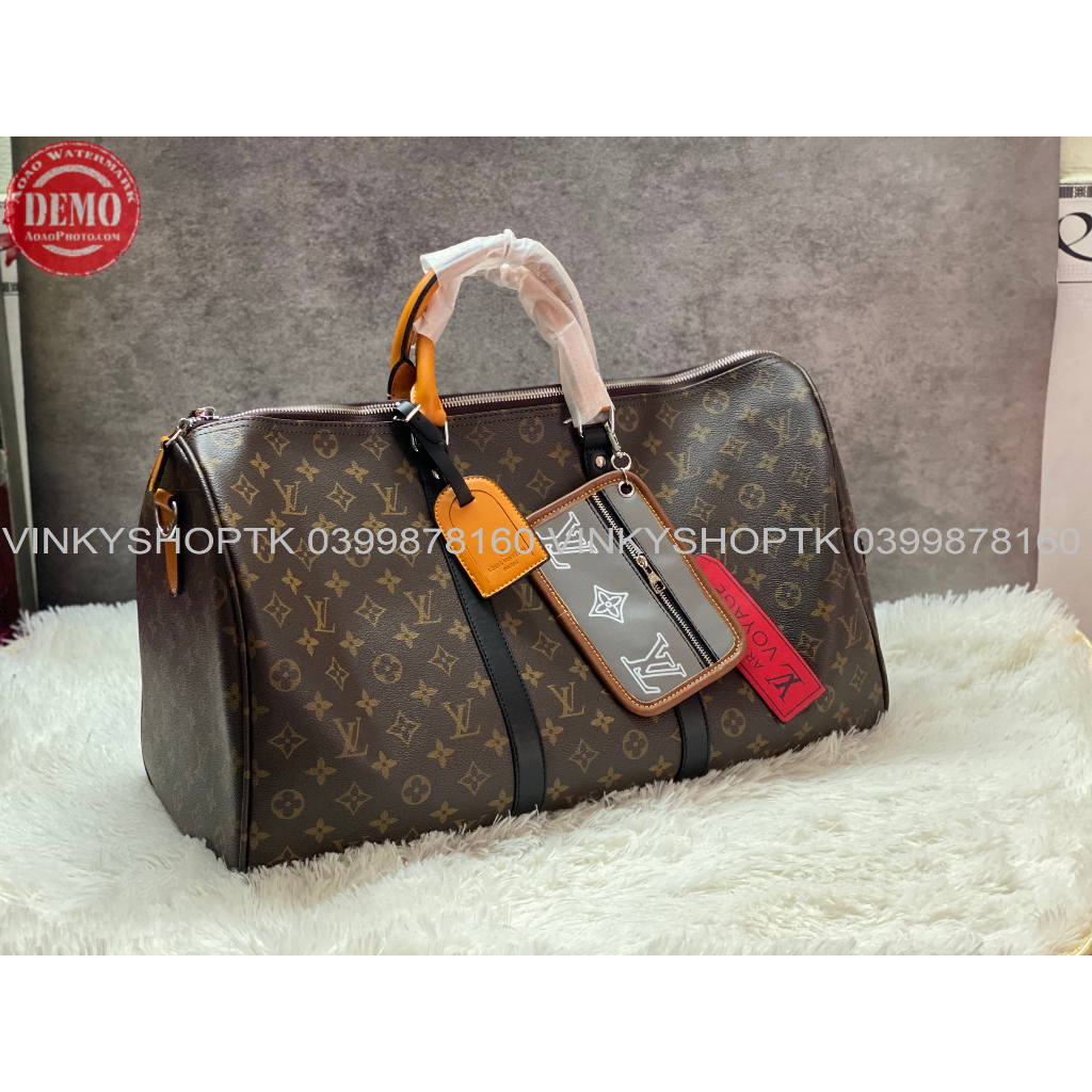 Túi du lịch l.v trống phối màu da thật size 50cm
