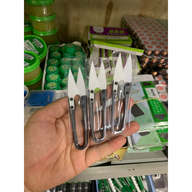 Kéo sứ chuyên làm pin chống chạm chập