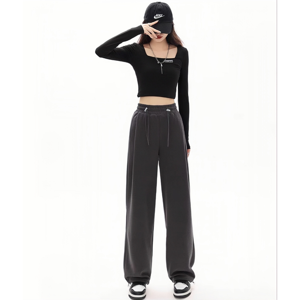 Quần ống rộng chất nỉ cao cấp, dày dặn. Cạp chun co giãn có dây khoá.