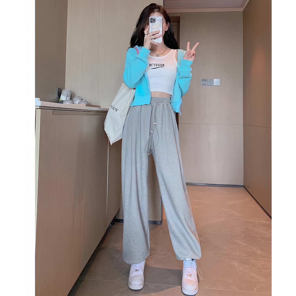 Quần ống rộng chất nỉ cao cấp, dày dặn. Cạp chun co giãn có dây khoá.