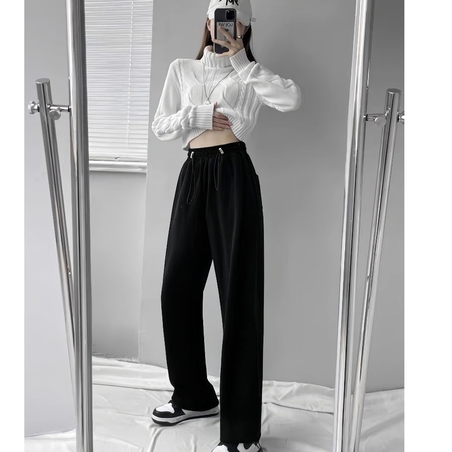 Quần ống rộng chất nỉ cao cấp, dày dặn. Cạp chun co giãn có dây khoá.