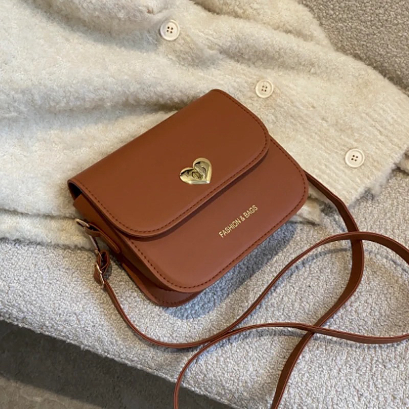 Túi xách nữ đeo chéo khoá trái tim bag.thuhien