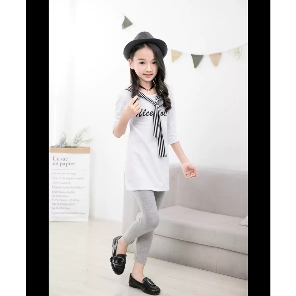 Quần legging bé gái , chất cotton co giãn, dai, mịn, mỏng vừa phải, đường may chắc chắn, không nhão, không xù.