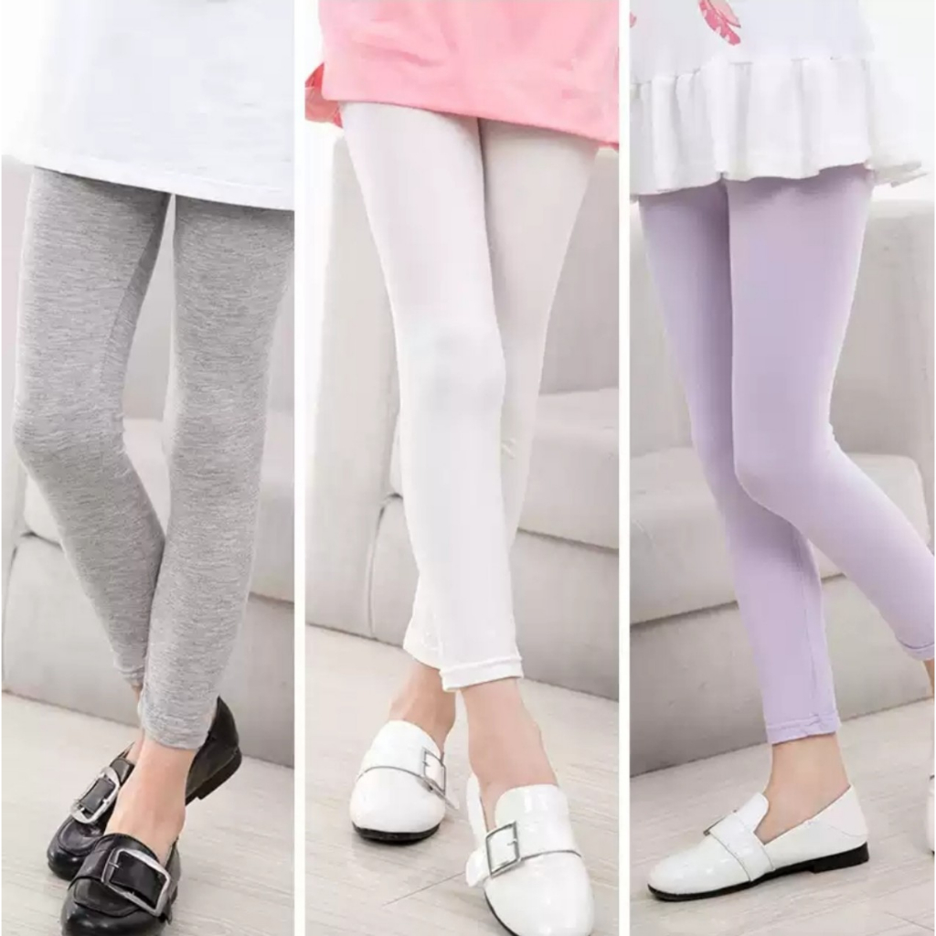 Quần legging bé gái , chất cotton co giãn, dai, mịn, mỏng vừa phải, đường may chắc chắn, không nhão, không xù.