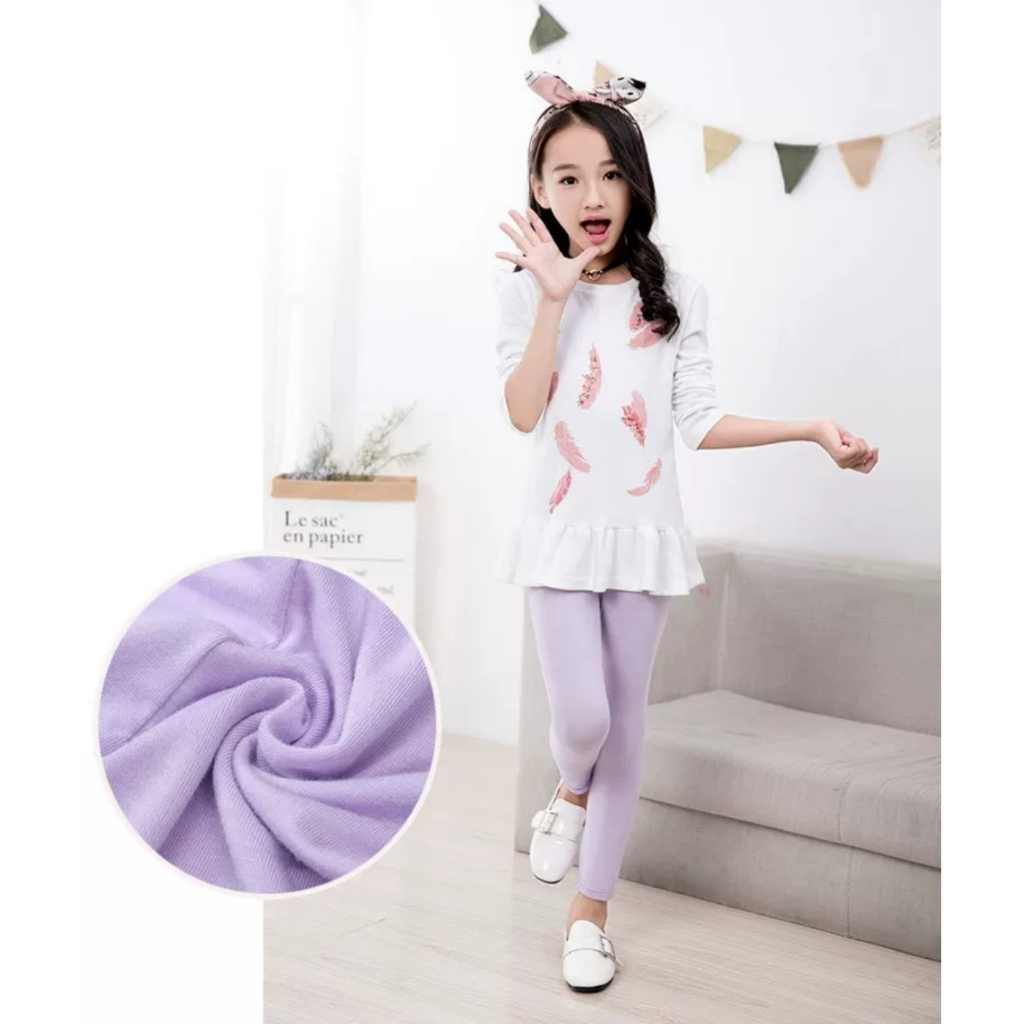 Quần legging bé gái , chất cotton co giãn, dai, mịn, mỏng vừa phải, đường may chắc chắn, không nhão, không xù.
