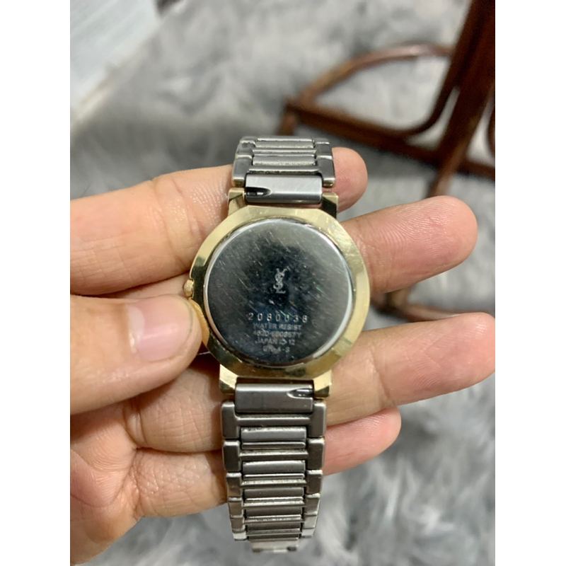 Đồng hồ YsL mặt xanh 2080038 tình trạng đa cũ