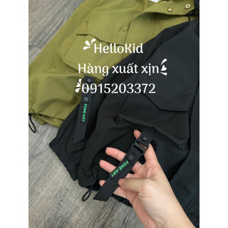 Áo gió trơn huy hiệu cho bé