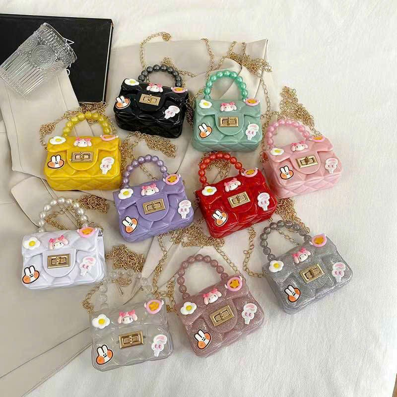 Túi đeo chéo túi nhựa mini quai ngọc có dán sticker dễ thương