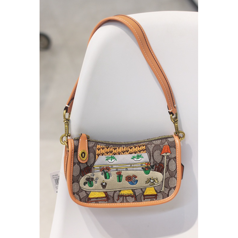 Túi coach swinger mẫu mới