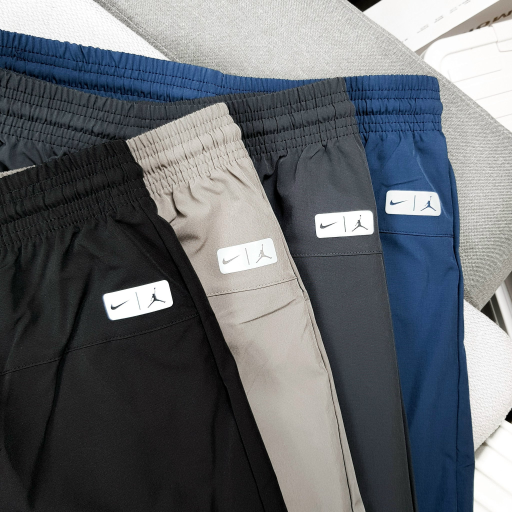 Quần thể thao nam tập Gym lưng thun dây rút túi khóa kéo Unisex  thun Xi dù - 2 màu