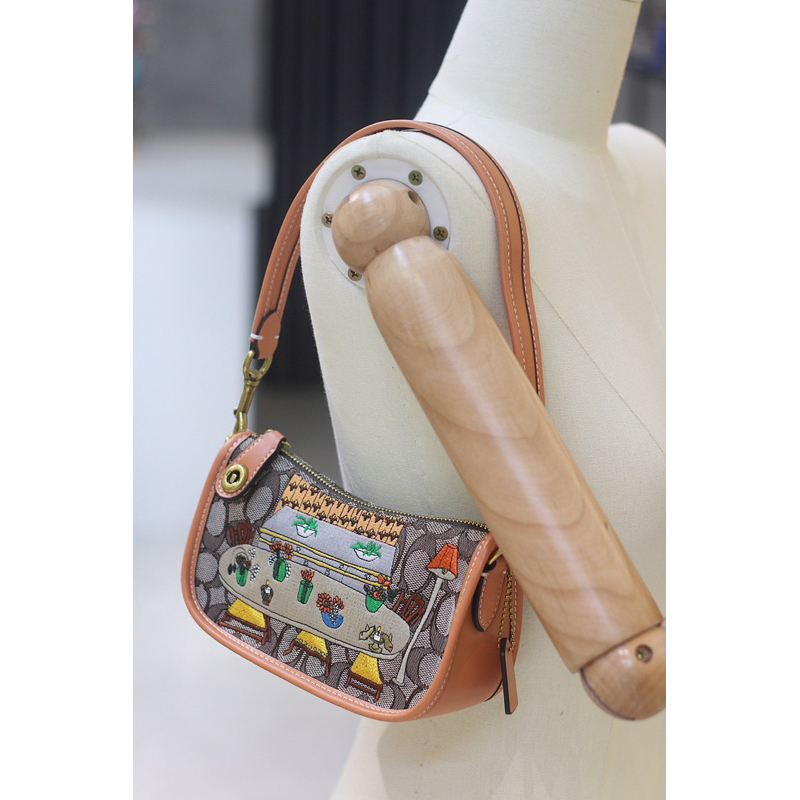 Túi coach swinger màu mới