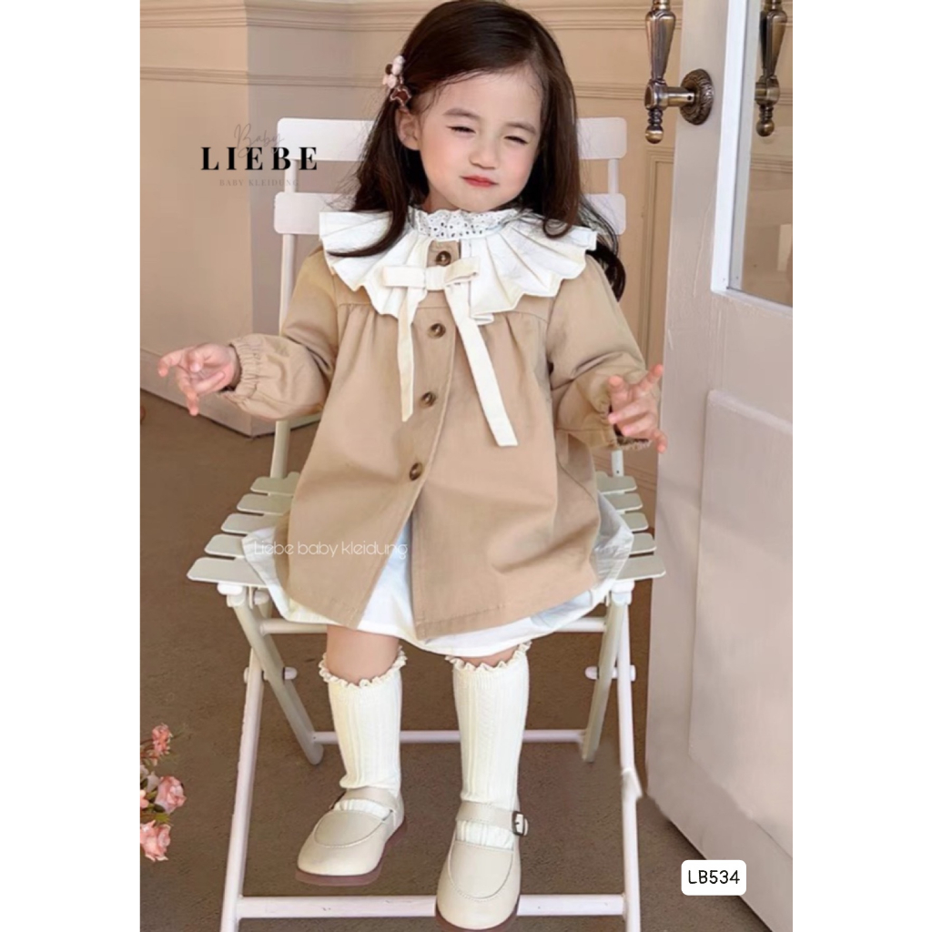 Áo khoác dáng váy kaki tiểu thư