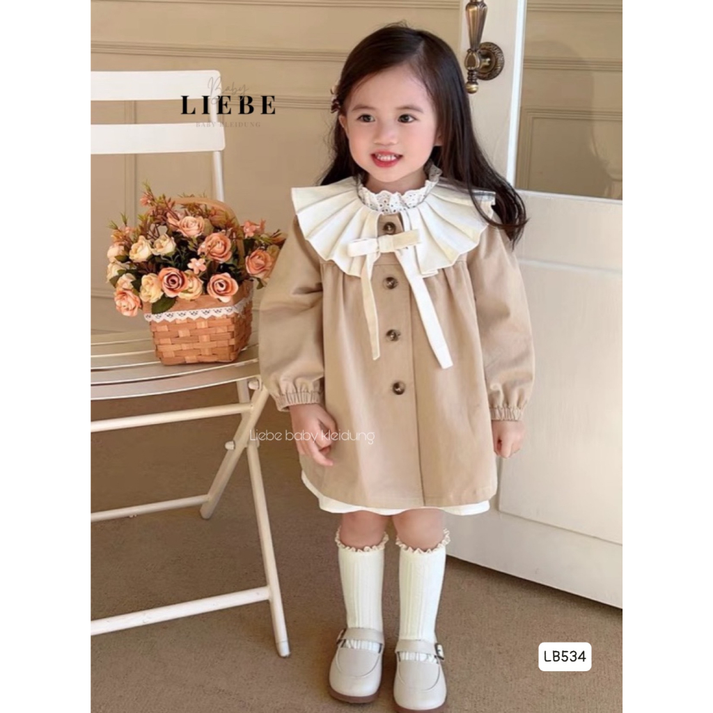 Áo khoác dáng váy kaki tiểu thư