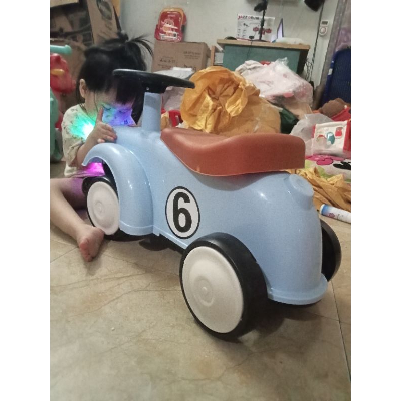 Xe chòi chân huggies có phát nhạc cho bé cao cấp