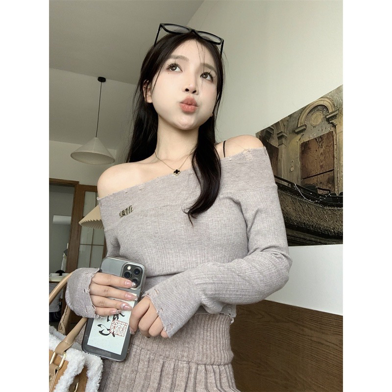 Pass áo len rách trễ vai hàng qc