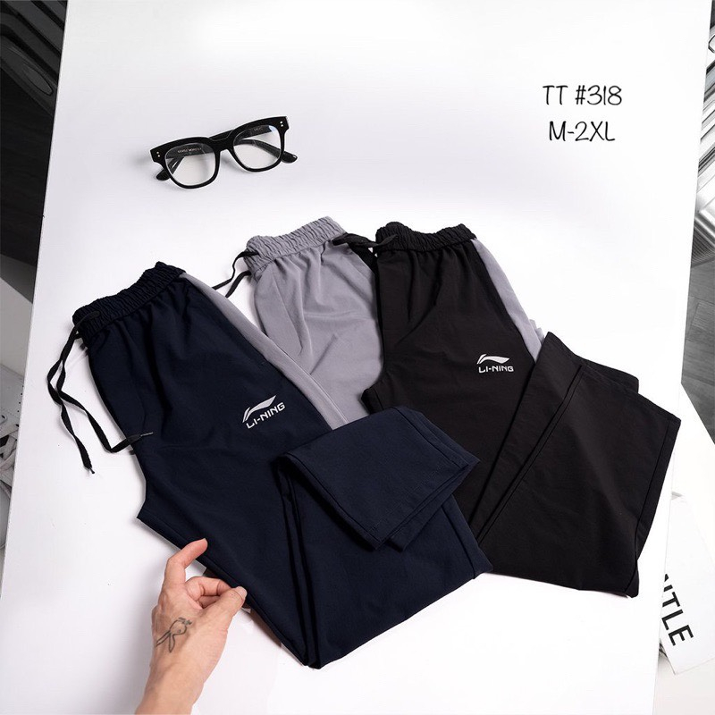 Quần gió Li- Ning cao cấp chất gió sần dầy dặn, quần thể thao phối màu đẹp, không nhăn nhàu hàng chất lượng MANKUDA