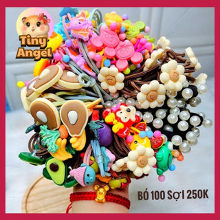 Chun cột tóc đính charm xinh ngẫu nhiên