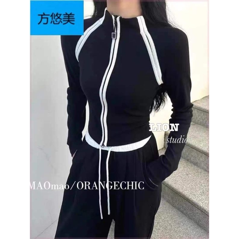Áo dây khóa kéo tay dài phối y hình
