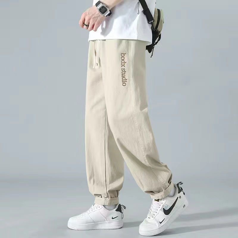 Quần kaki nam logo thêu, quần kaki nam eo chun nam