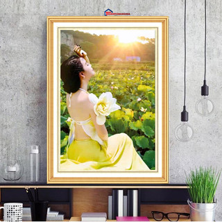 Tranh đính đá LV363 (50cm x 75cm), tranh thêu chữ thập thiếu nữ bên sen LV3337 (43cm x 63cm)