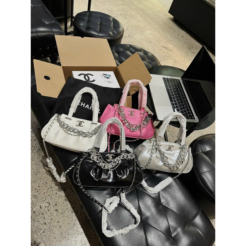 Túi C.N quai xách xích bạc